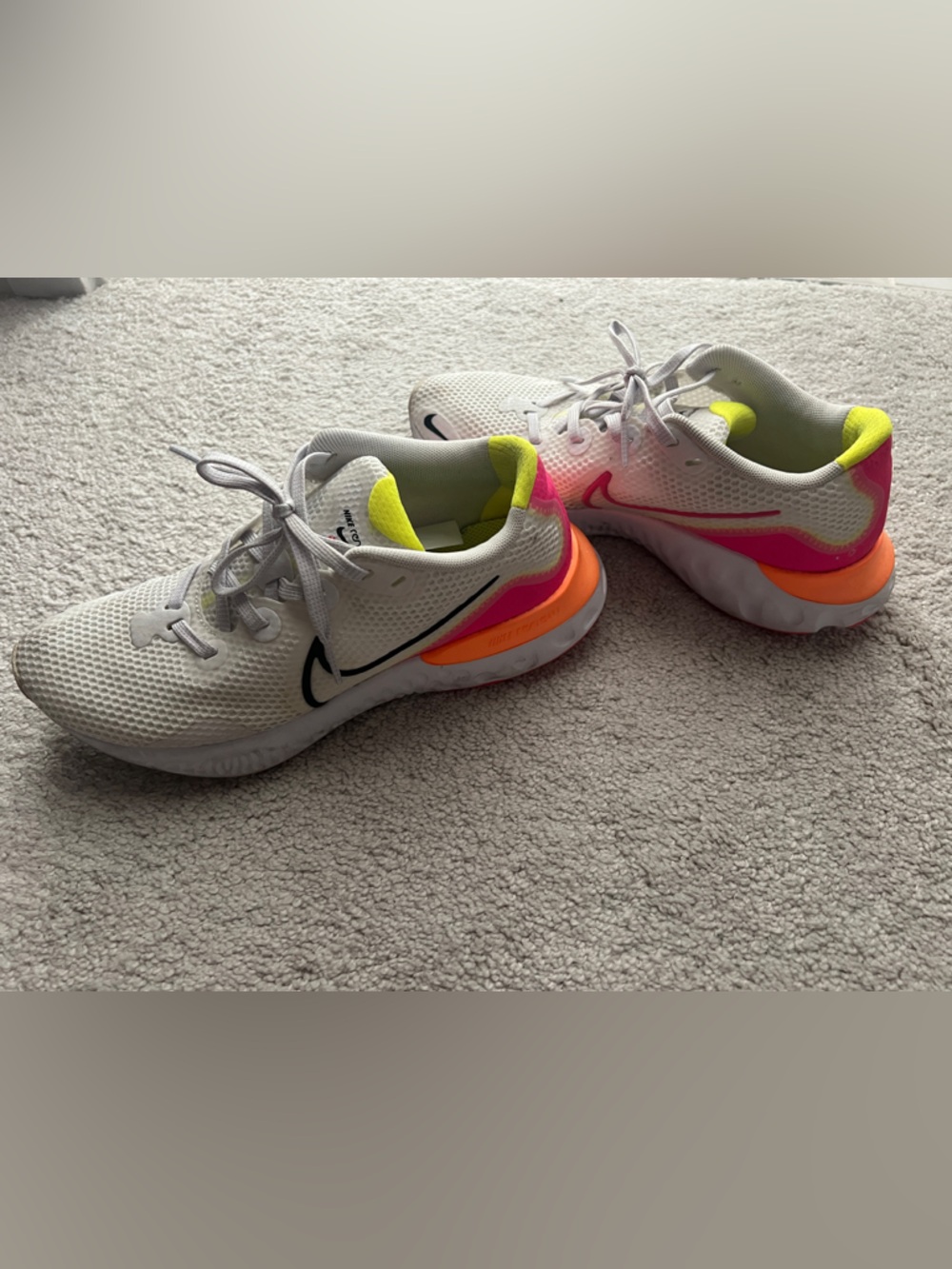 Nike White Athletic Shoes with Neon Yellow, Pink & Orange Accents